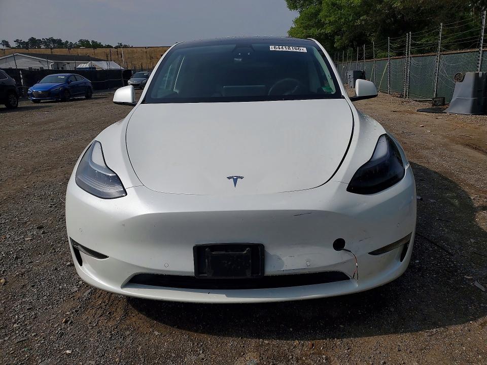Photo 5 from auction – 2022 TESLA MODEL Y with VIN 7SAYGDEF1NF446205