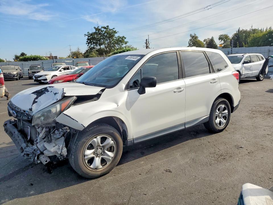 SUBARU FORESTER 2018 with VIN JF2SJAAC2JH593272 - Photo from auction