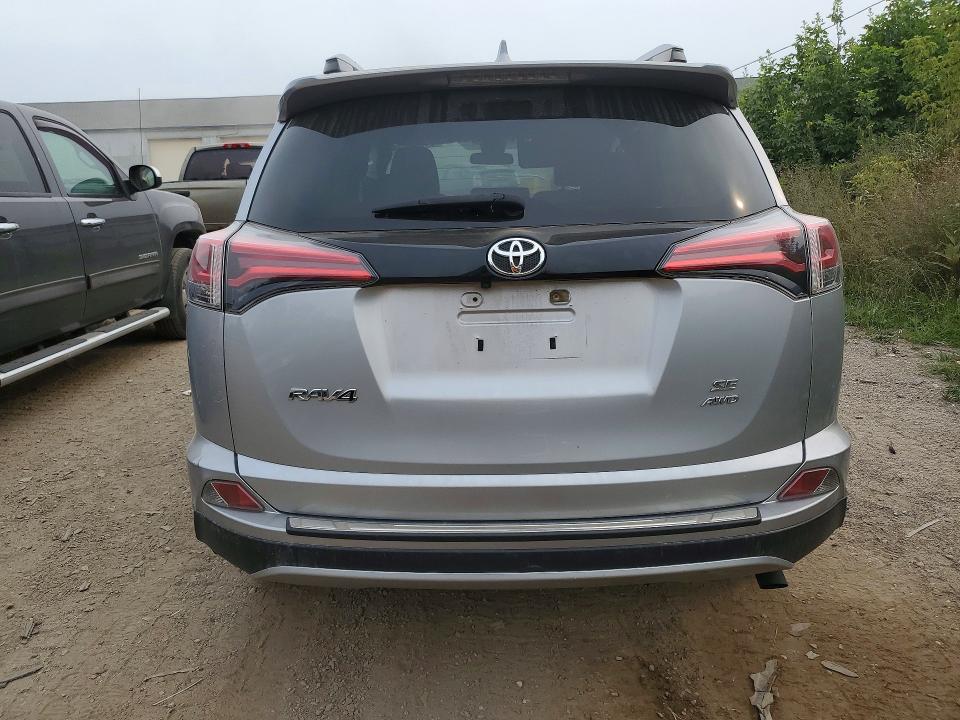 Photo 6 from auction – 2018 TOYOTA RAV4 with VIN JTMJFREV9JJ240378