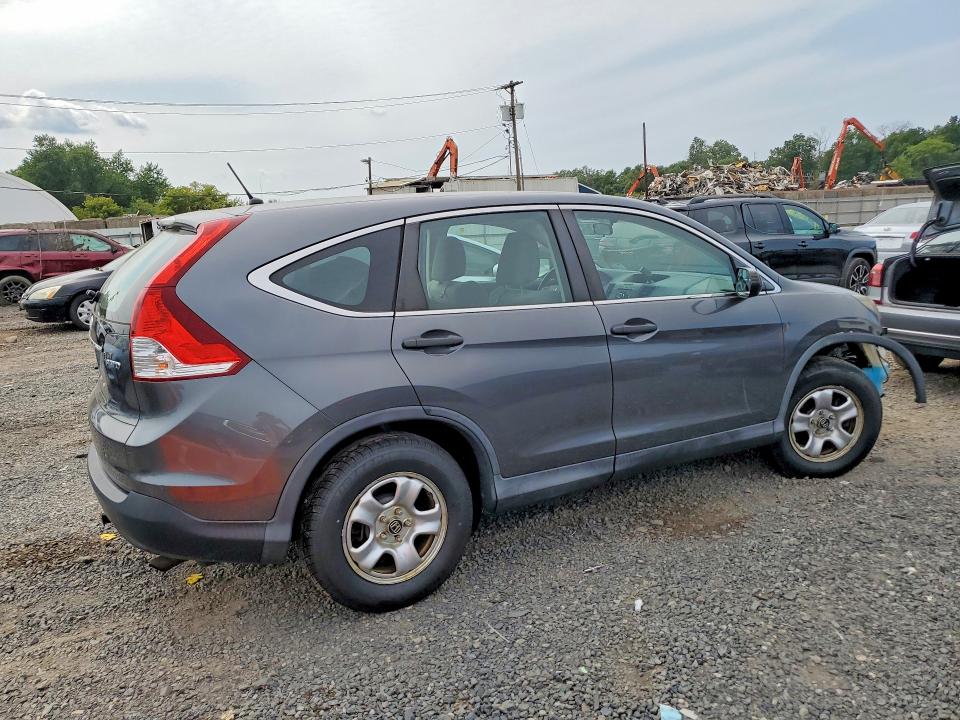 Photo 3 from auction – 2013 HONDA CR-V with VIN 2HKRM4H36DH642023