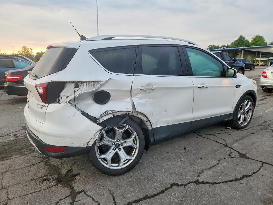 Photo 3 from auction – 2019 FORD ESCAPE with VIN 1FMCU9J93KUC37141