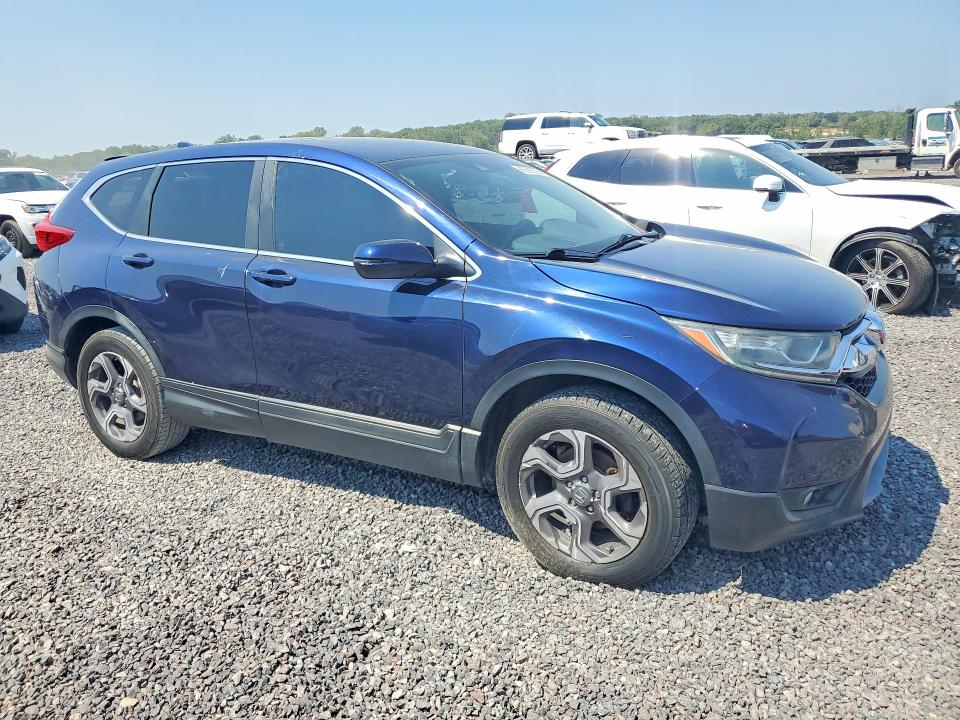 Photo 4 from auction – 2018 HONDA CR-V with VIN 7FARW2H51JE069269