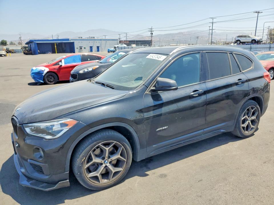 BMW X1 2016 with VIN WBXHT3C36GP884175 - Photo from auction