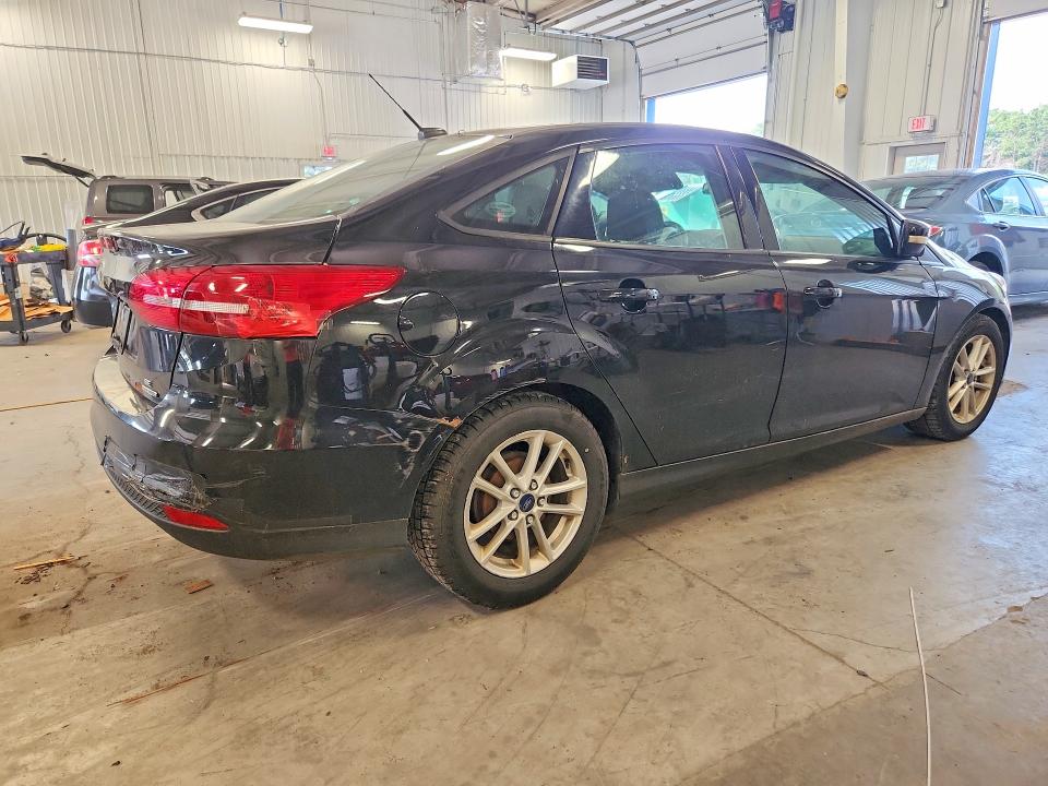Photo 3 from auction – 2016 FORD FOCUS with VIN 1FADP3F28GL282216