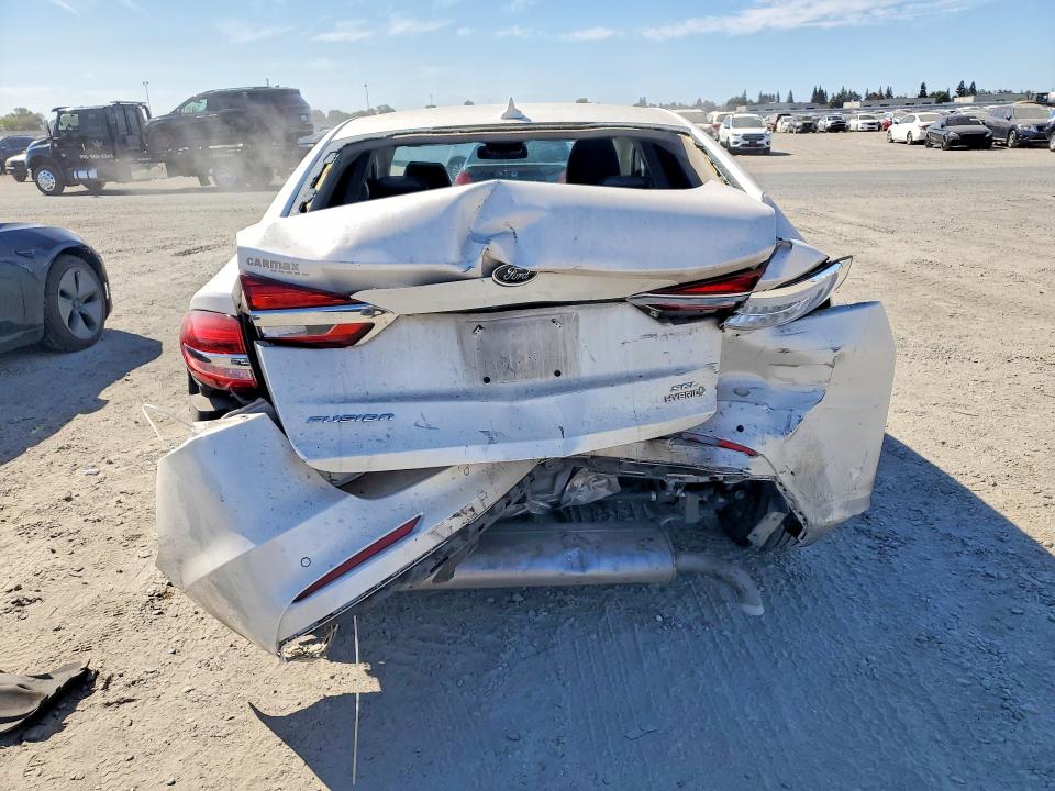 Photo 6 from auction – 2019 FORD FUSION with VIN 3FA6P0MU9KR176217