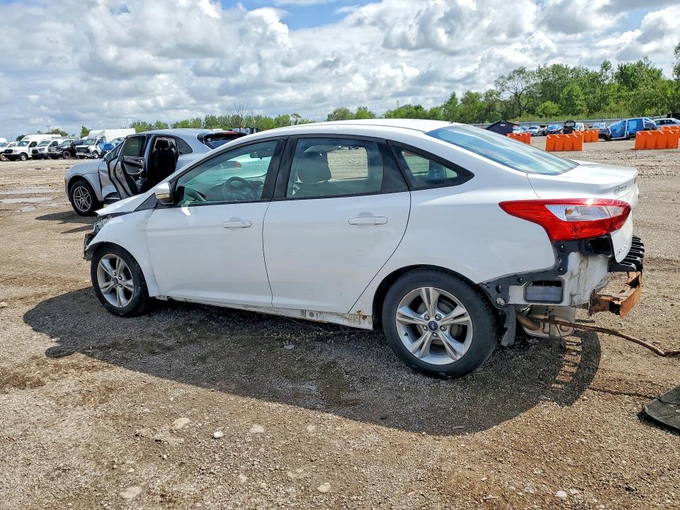 Снимка 2 от търг – 2014 FORD FOCUS с VIN 1FADP3F24EL286342