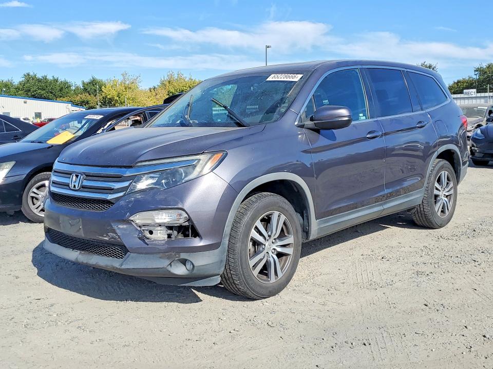 HONDA PILOT 2018 with VIN 5FNYF6H51JB027943 - Photo from auction