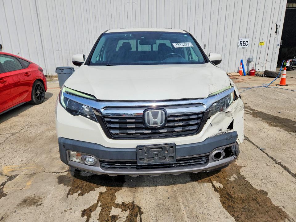Photo 5 from auction – 2019 HONDA RIDGELINE with VIN 5FPYK3F76KB029596