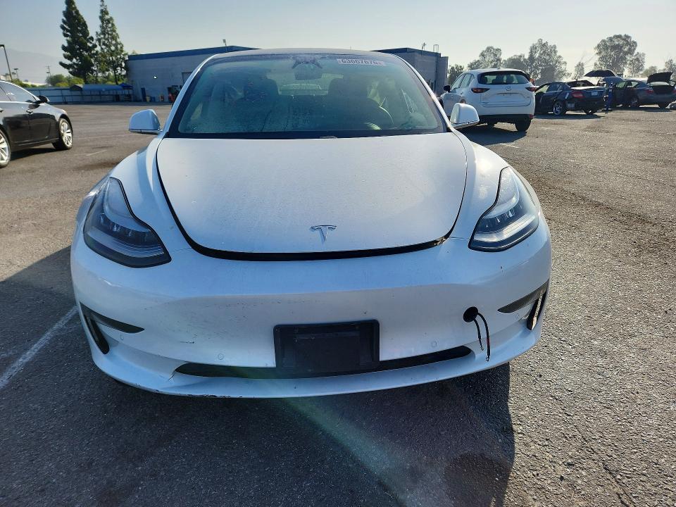 Снимка 5 от търг – 2020 TESLA MODEL 3 с VIN 5YJ3E1EA1LF658860