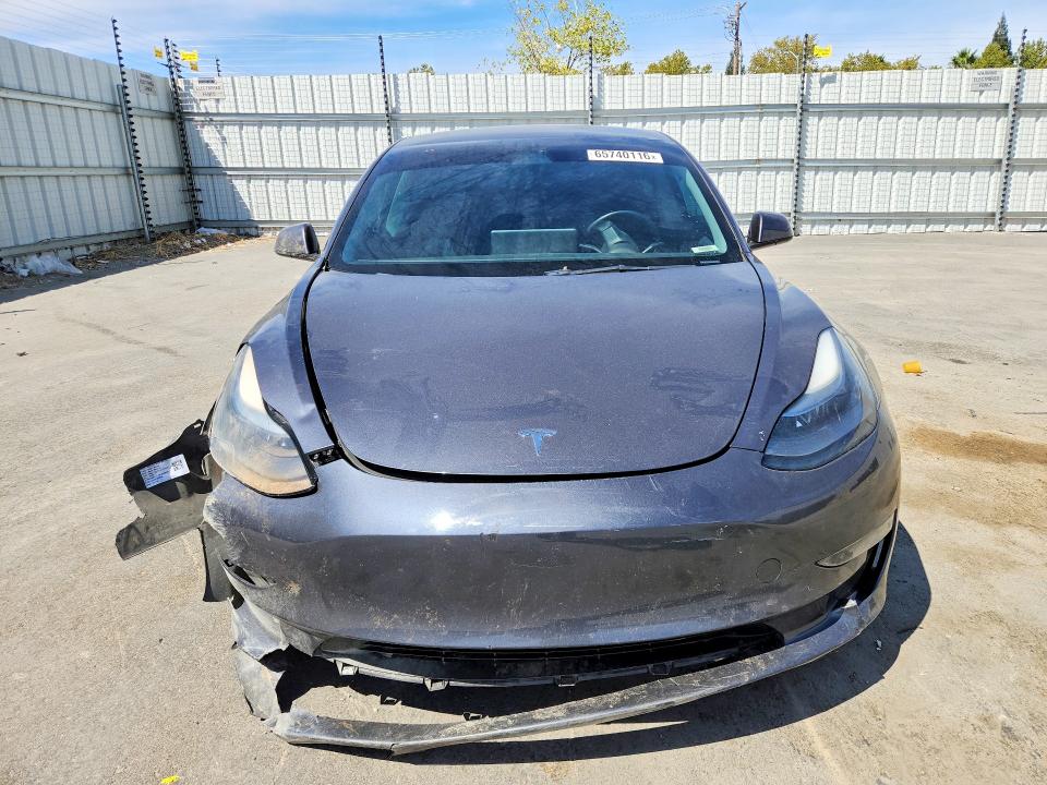 Photo 5 from auction – 2023 TESLA MODEL 3 with VIN 5YJ3E1EA9PF457942