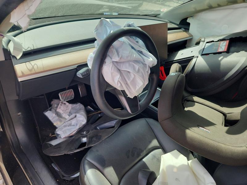 Photo 8 from auction – 2022 TESLA MODEL 3 with VIN 5YJ3E1EB5NF273829