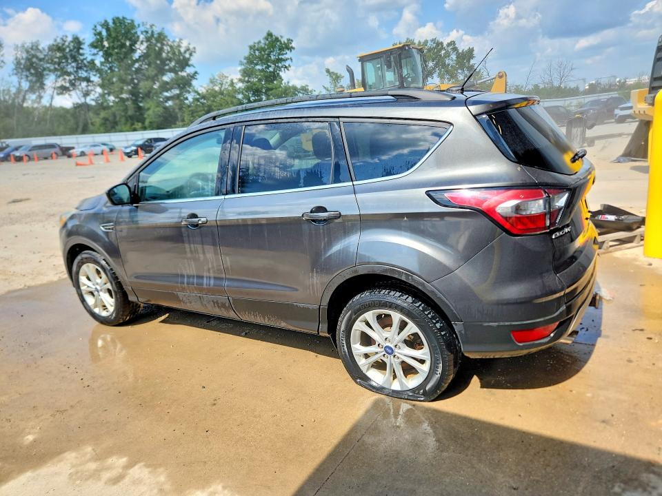Photo 2 from auction – 2018 FORD ESCAPE with VIN 1FMCU9GD7JUC28744