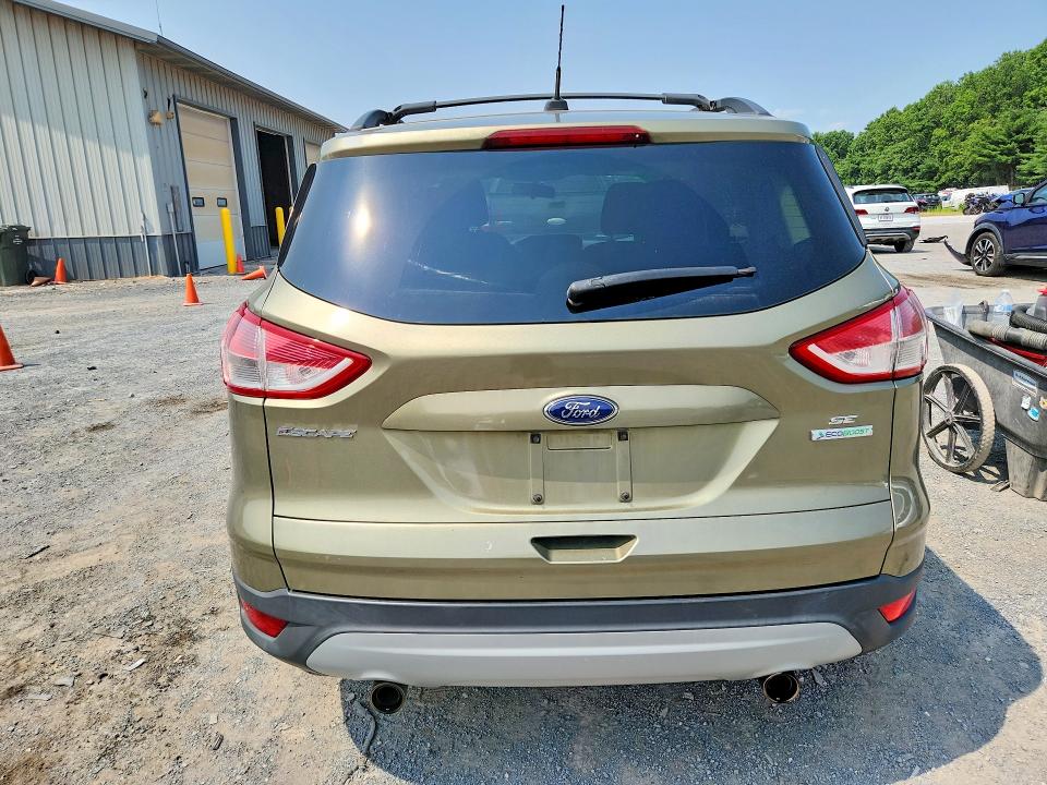 Photo 6 from auction – 2013 FORD ESCAPE with VIN 1FMCU0GX7DUC98688