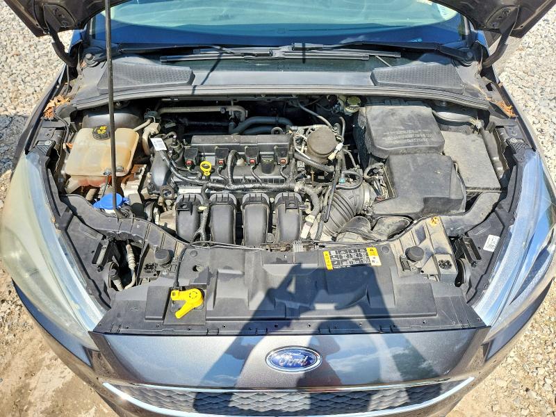 Photo 11 from auction – 2015 FORD FOCUS with VIN 1FADP3F29FL201920