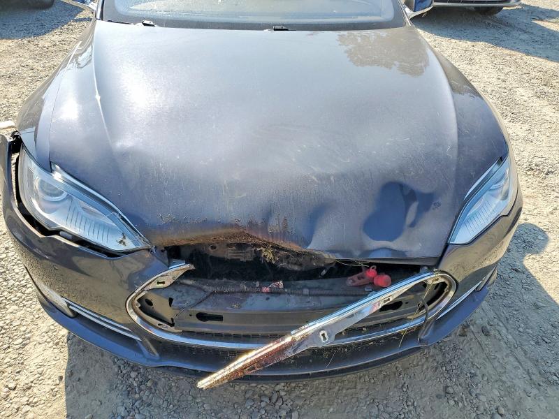 Photo 11 from auction – 2015 TESLA MODEL S with VIN 5YJSA4H44FF081289