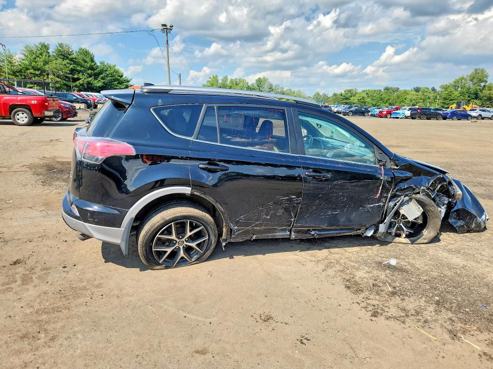 Photo 3 from auction – 2017 TOYOTA RAV4 with VIN 2T3JFREV6HW639325