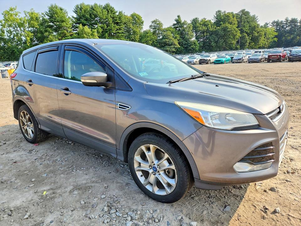 Photo 4 from auction – 2013 FORD ESCAPE with VIN 1FMCU9H96DUC90294