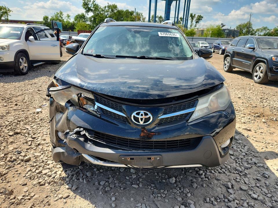 Photo 5 from auction – 2014 TOYOTA RAV4 with VIN 2T3DFREVXEW204736