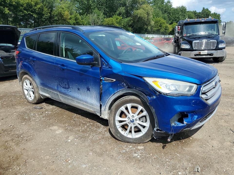 Photo 4 from auction – 2017 FORD ESCAPE with VIN 1FMCU9GD0HUC94899