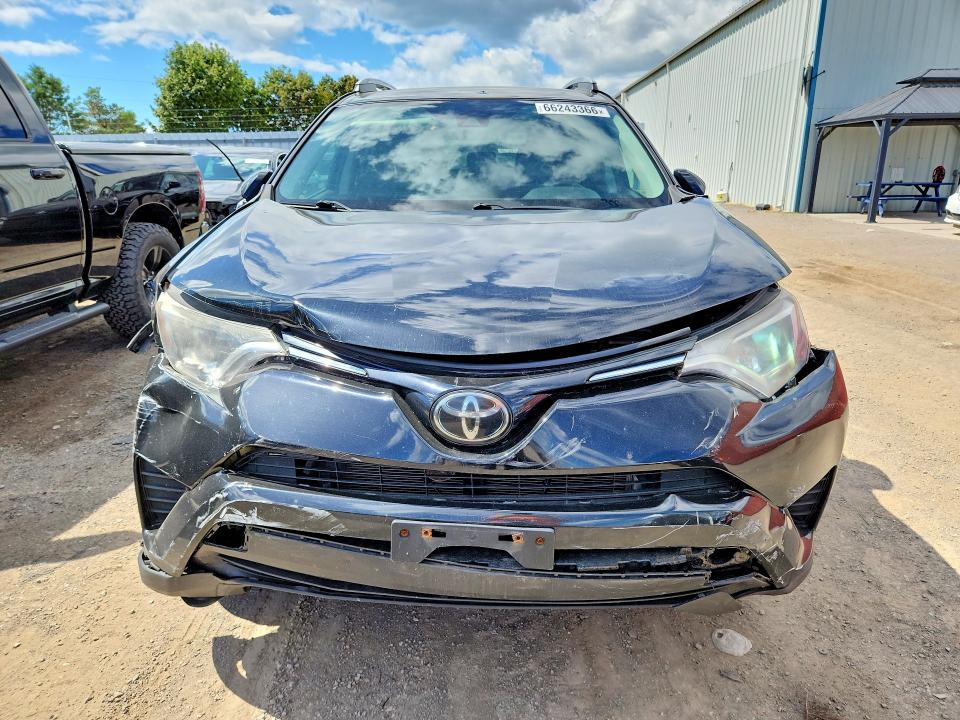 Photo 5 from auction – 2018 TOYOTA RAV4 with VIN 2T3BFREV6JW790479
