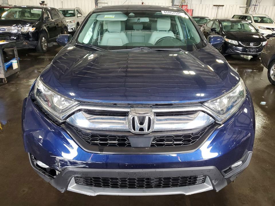 Photo 5 from auction – 2019 HONDA CR-V with VIN 7FARW2H86KE005496