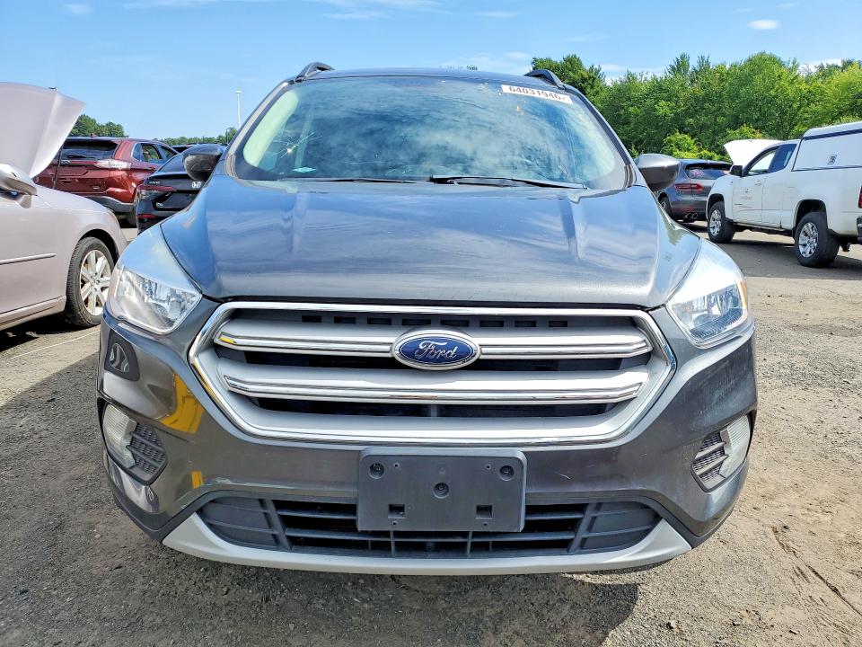 Photo 5 from auction – 2018 FORD ESCAPE with VIN 1FMCU9GD9JUB92099
