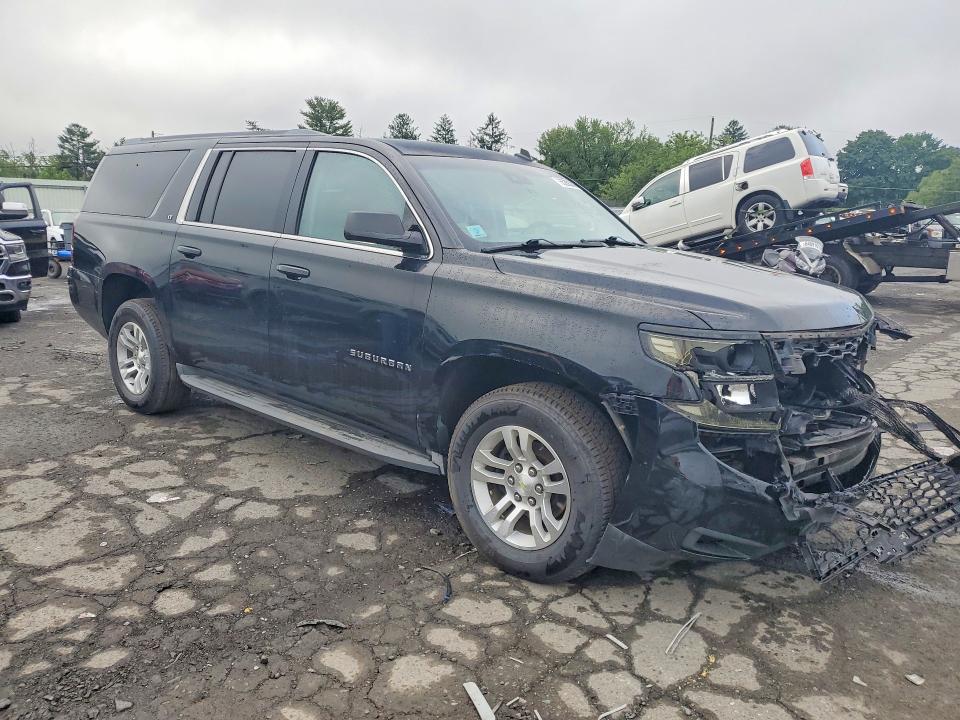 Photo 4 from auction – 2015 CHEVROLET SUBURBAN with VIN 1GNSKJKC2FR227203