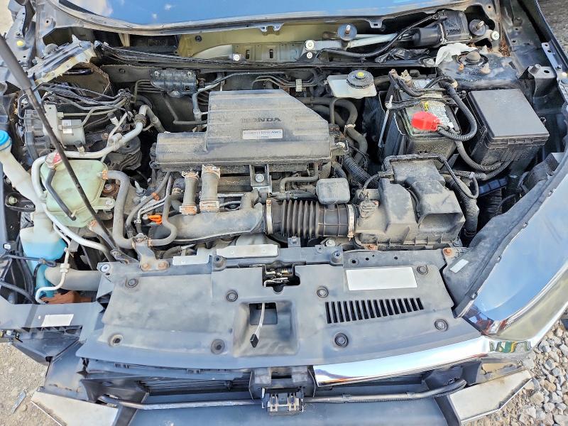 Photo 12 from auction – 2018 HONDA CR-V with VIN 2HKRW2H59JH601896