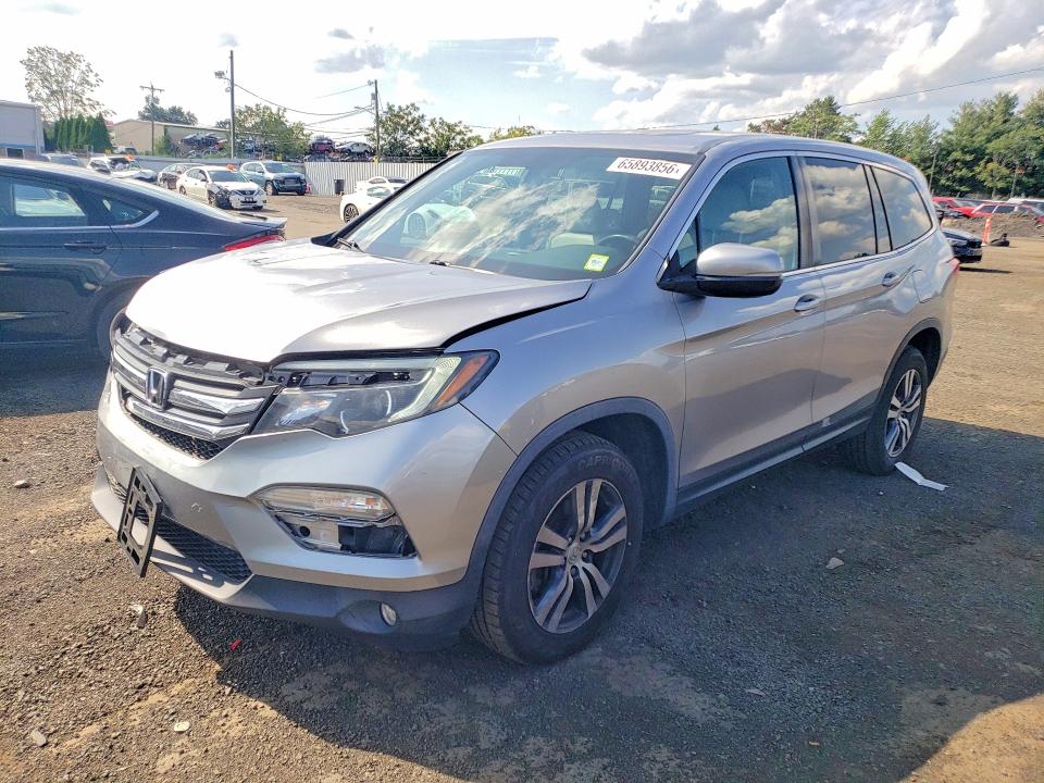 HONDA PILOT 2017 with VIN 5FNYF6H59HB090444 - Photo from auction