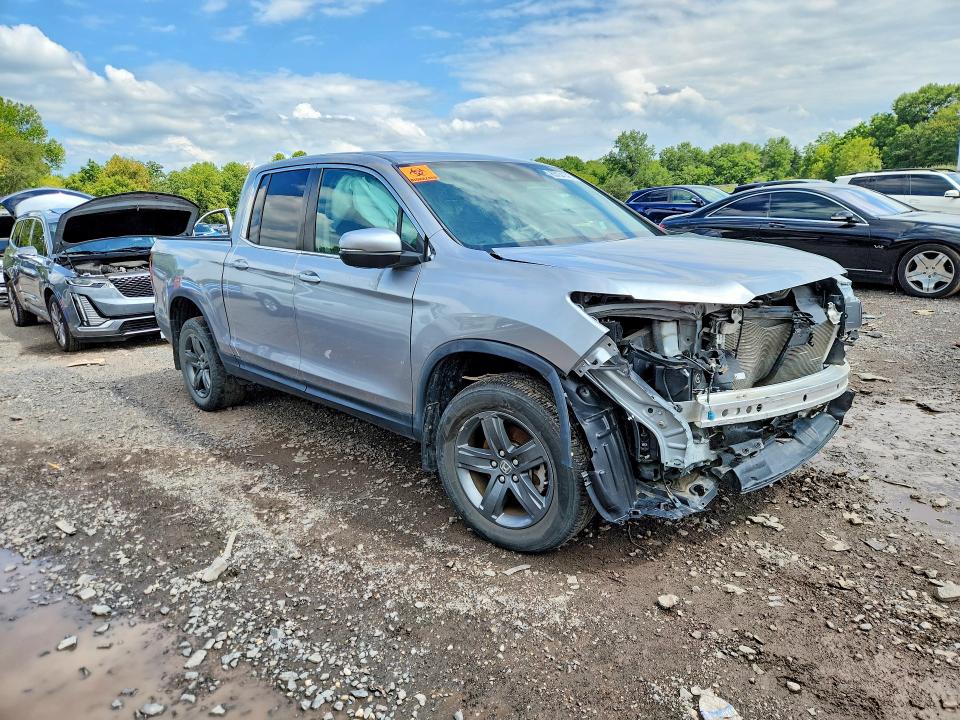 Photo 4 from auction – 2021 HONDA RIDGELINE with VIN 5FPYK3F50MB023505