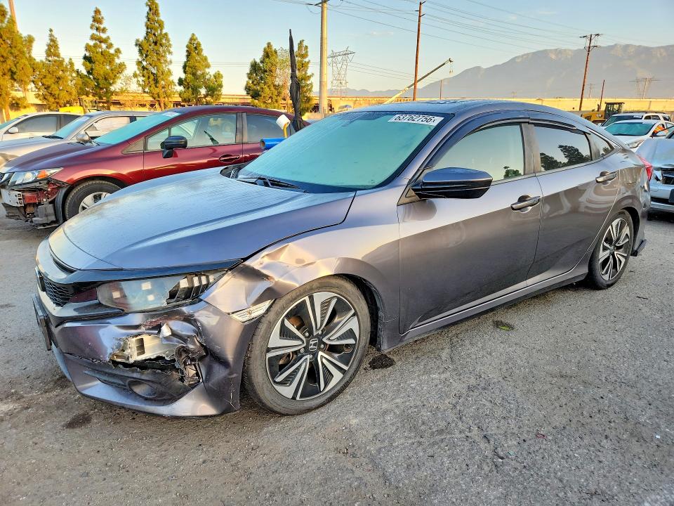 HONDA CIVIC 2018 with VIN JHMFC1F36JX030202 - Photo from auction