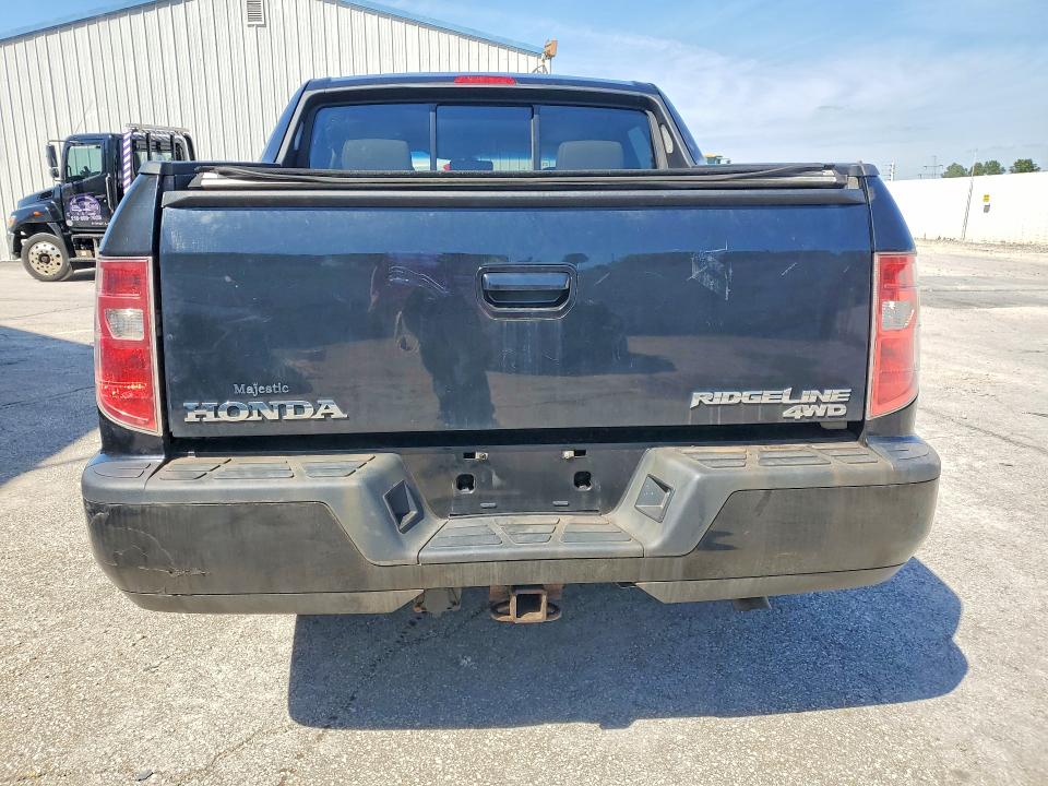 Photo 6 from auction – 2011 HONDA RIDGELINE with VIN 5FPYK1F57BB501193
