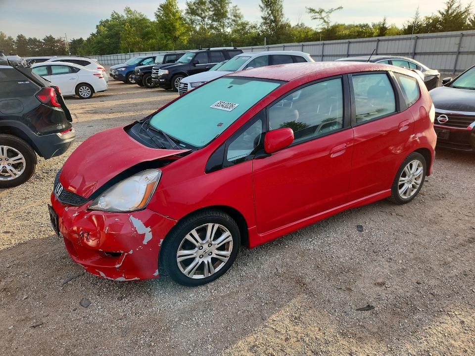 HONDA FIT 2009 with VIN JHMGE88689C006114 - Photo from auction