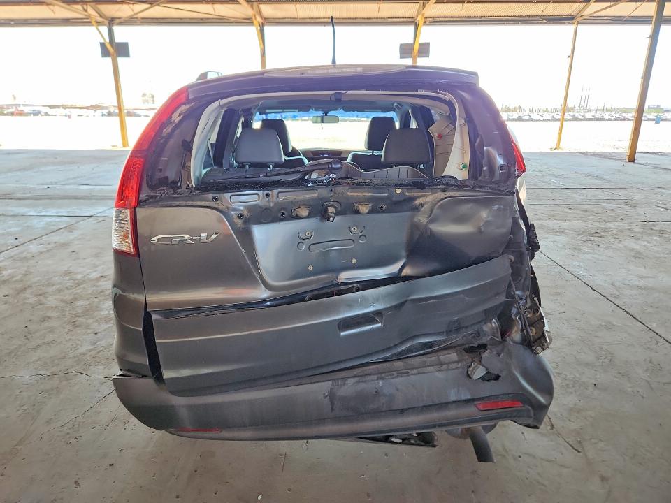 Photo 6 from auction – 2014 HONDA CR-V with VIN 2HKRM3H79EH529553