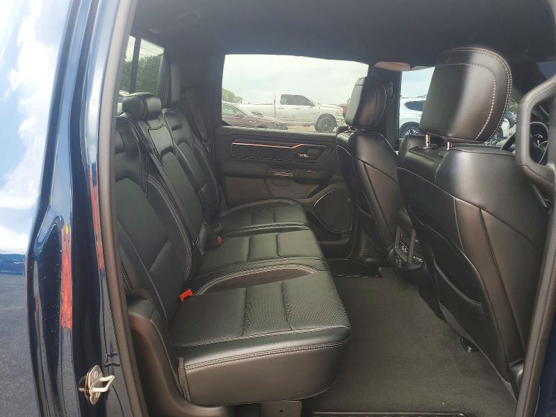 Photo 10 from auction – 2023 RAM 1500 with VIN 1C6RREJT0PN670445