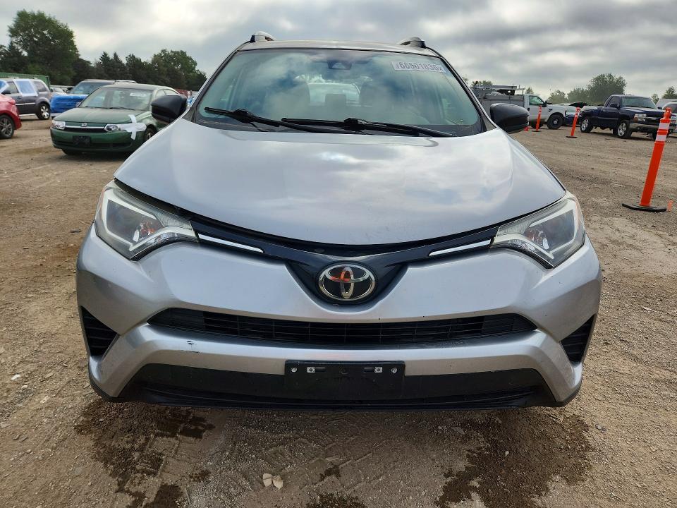 Photo 5 from auction – 2018 TOYOTA RAV4 with VIN JTMZFREV3JJ158343