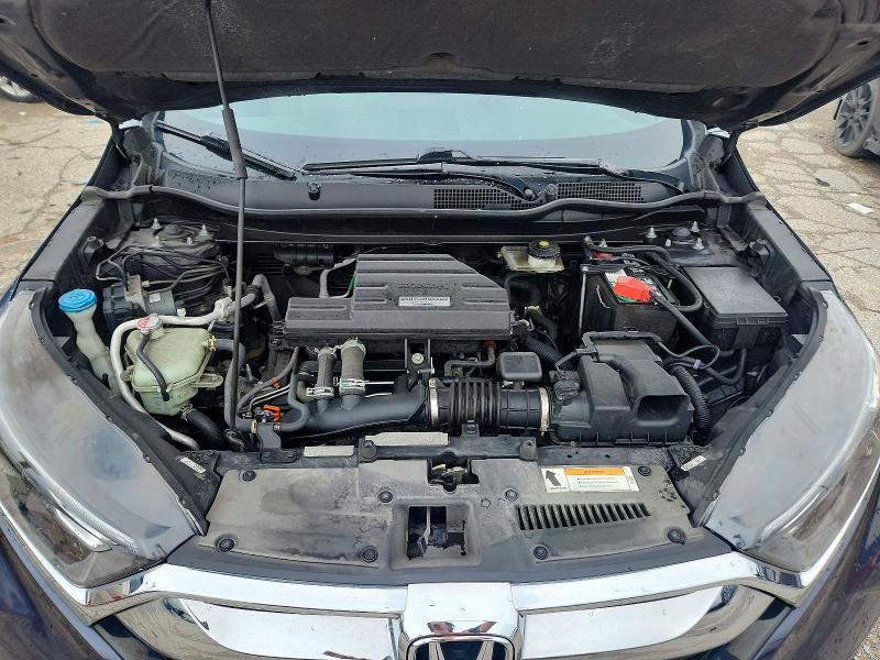 Photo 12 from auction – 2018 HONDA CR-V with VIN 7FARW2H51JE013297