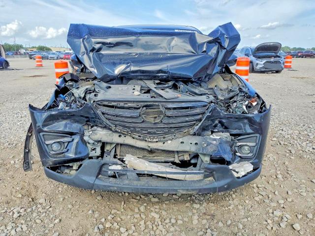 Photo 5 from auction – 2016 MAZDA CX-5 with VIN JM3KE2DY5G0708932