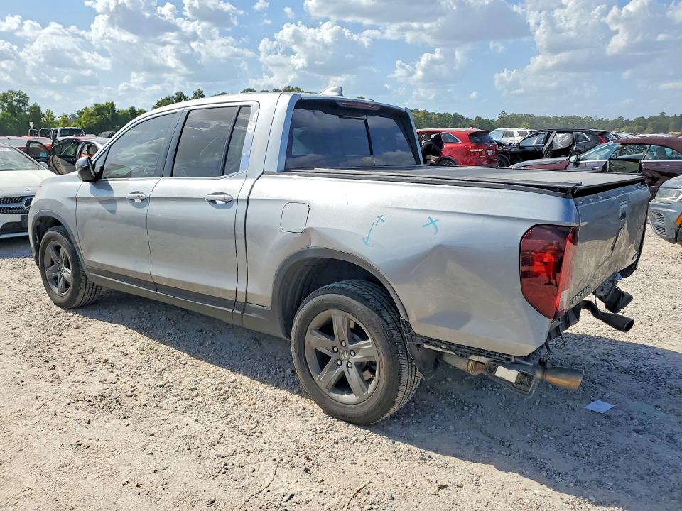 Photo 2 from auction – 2023 HONDA RIDGELINE with VIN 5FPYK3F58PB048253