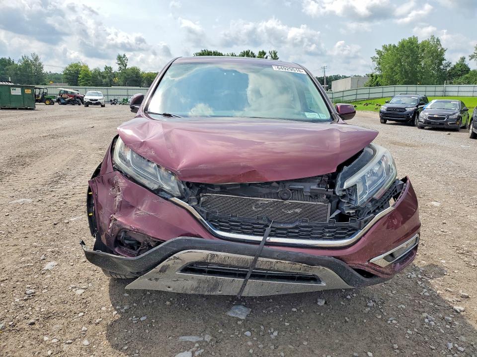 Photo 5 from auction – 2016 HONDA CR-V with VIN 5J6RM4H53GL112619