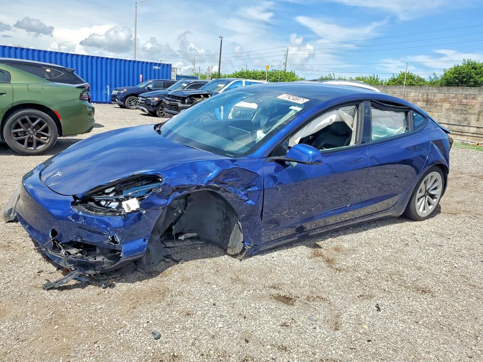 TESLA MODEL 3 2022 with VIN 5YJ3E1EA2NF372292 - Photo from auction