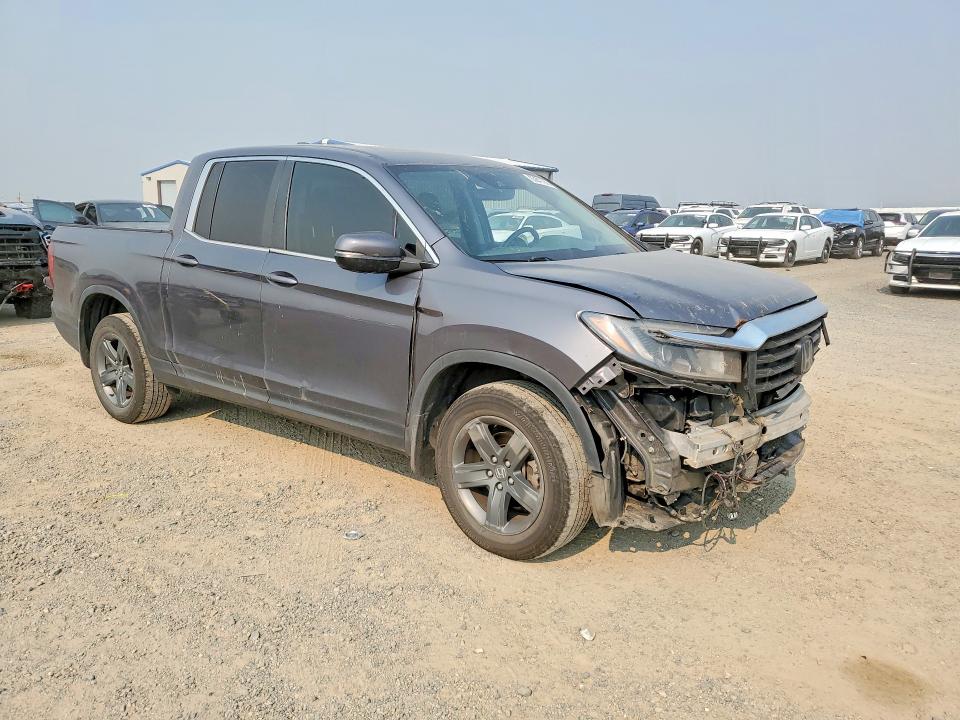 Photo 4 from auction – 2023 HONDA RIDGELINE with VIN 5FPYK3F57PB007225