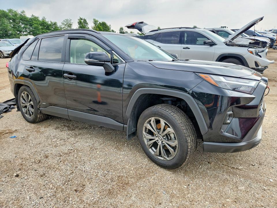 Photo 4 from auction – 2023 TOYOTA RAV4 with VIN JTMB6RFV0PD110631