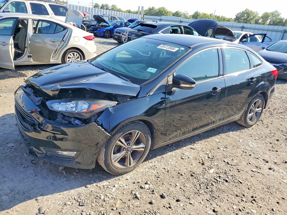 FORD FOCUS 2018 with VIN 1FADP3F2XJL309682 - Photo from auction