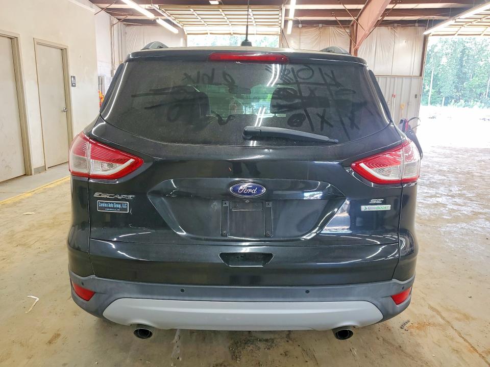 Photo 6 from auction – 2014 FORD ESCAPE with VIN 1FMCU0GX0EUB53686