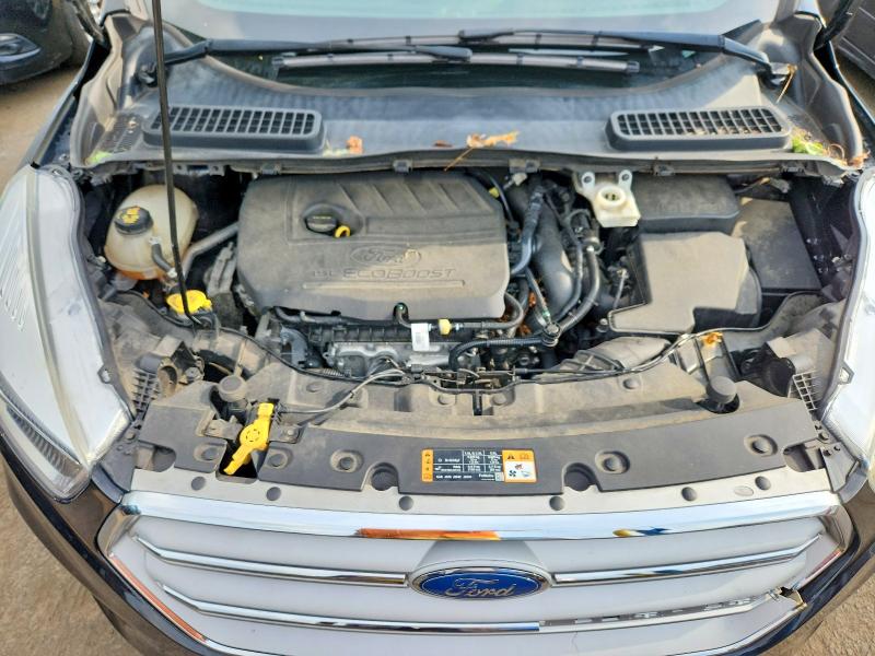 Photo 11 from auction – 2018 FORD ESCAPE with VIN 1FMCU9GD6JUC40786