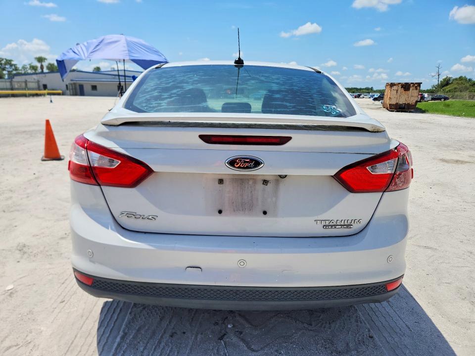 Photo 6 from auction – 2014 FORD FOCUS with VIN 1FADP3J21EL240653