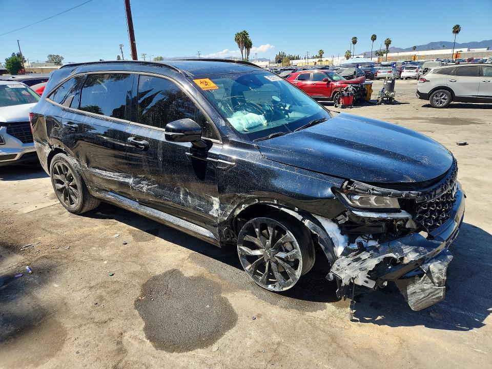 Photo 4 from auction – 2023 KIA SORENTO with VIN 5XYRK4LF2PG202951