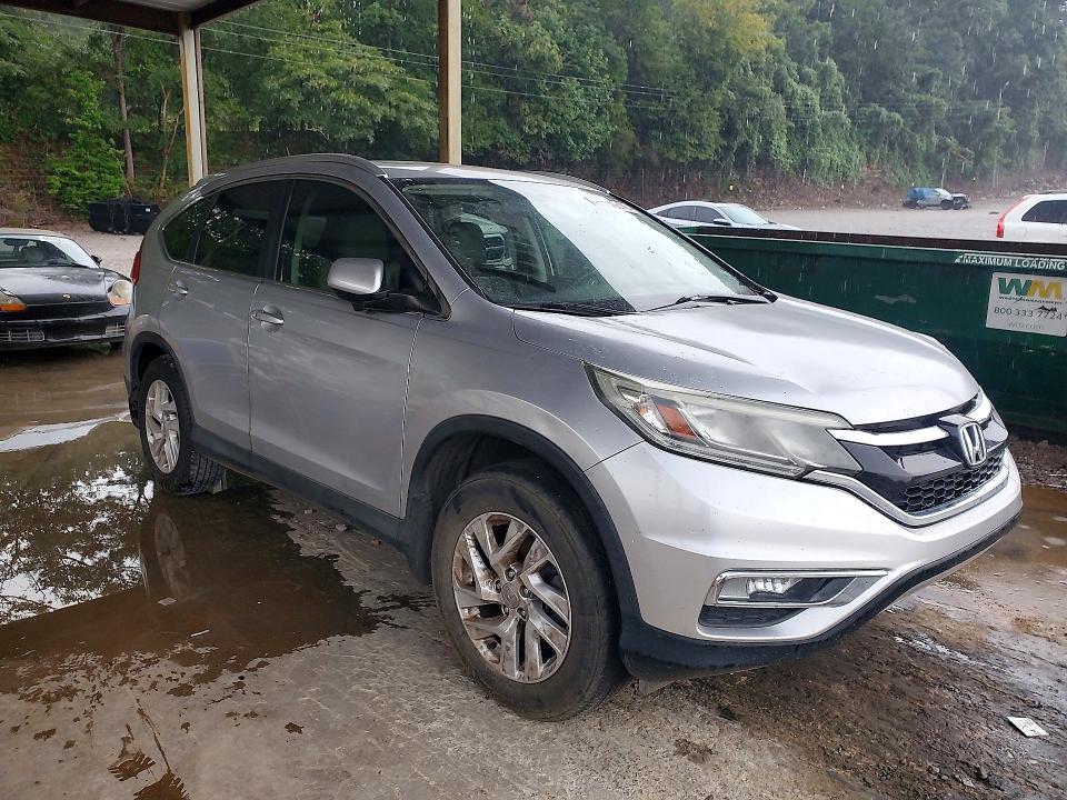 Photo 4 from auction – 2015 HONDA CR-V with VIN 2HKRM3H78FH514365