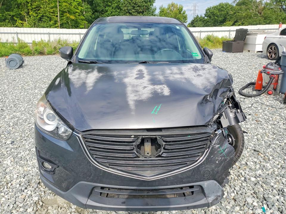 Photo 5 from auction – 2016 MAZDA CX-5 with VIN JM3KE2CYXG0791419